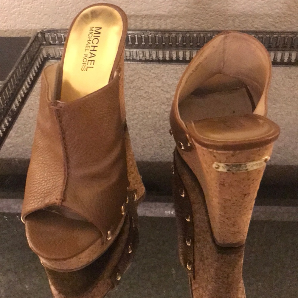 Michael Kors slip on wedges, with gold studs.